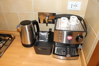 a coffee maker sitting on top of a counter at Interno 10 in Rome