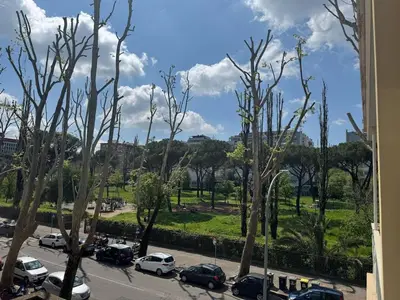 a view of a parking lot with parked cars at Studio in the Green Roma in Rome