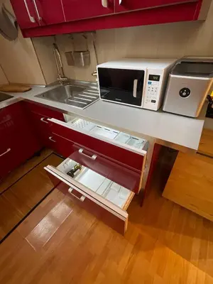 a kitchen with a microwave on a counter at AT Simone Cavallini in Rome