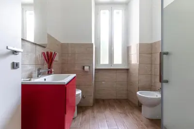 a bathroom with a sink and a toilet at Mami Garden in Rome