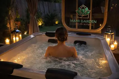 a jacuzzi tub in a yard with a patio at Mami Garden in Rome