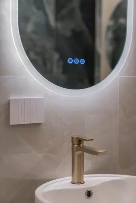 a bathroom with a sink and a mirror at Heart of Rome - Pantheon View in Rome