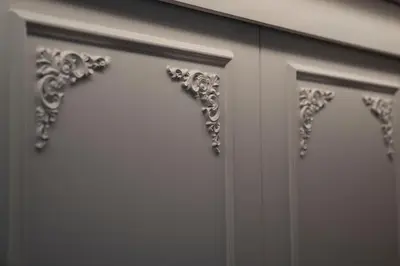 a white cabinet with silver decorations on it at Heart of Rome - Pantheon View in Rome