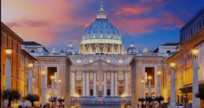 a large white building with a domed building at Ottavia apartment in Rome