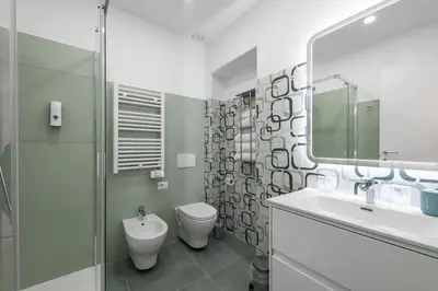 a bathroom with a toilet and a sink and a shower at 753 Roma in Rome