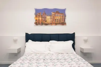 a bedroom with a bed with two night stands at 753 Roma in Rome