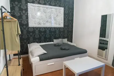 a bathroom with a toilet and a sink and a shower at Station Loft Trastever's Homies in Rome