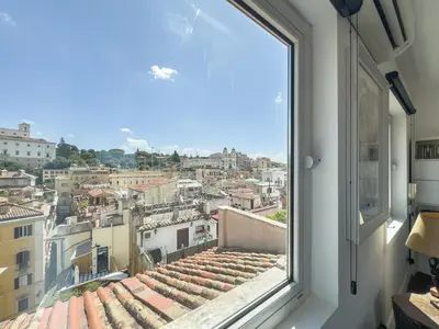 a view from a window of a city at Chasing the Stars Spanish Steps Boutique Suite in Rome