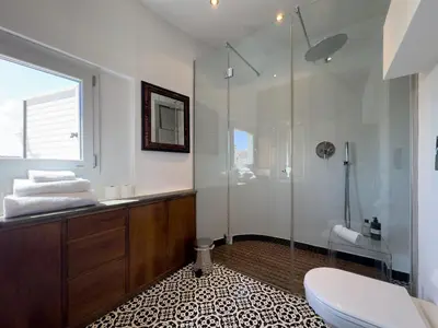 a bathroom with a shower and a toilet and a sink at Chasing the Stars Spanish Steps Boutique Suite in Rome