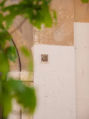 a white door with a picture of a dog on it at Labicana - Rome Apartment in Rome