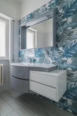 a bathroom with a sink and a mirror at B&B Damagi in Rome