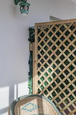 a wooden wine cellar with a wooden wine rack at B&B Damagi in Rome