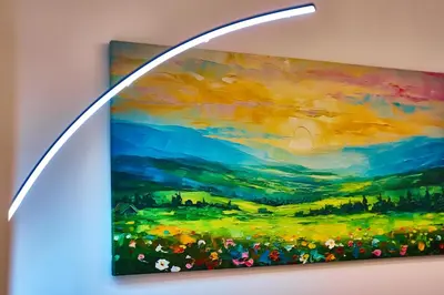 a painting of a field with flowers on a wall at Vatican Meadows Apartment in Rome