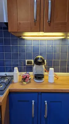 a kitchen counter with a tea kettle on a counter top at Re di Roma vacation in Rome
