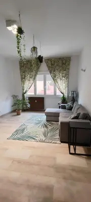 a large living room with a couch and a rug at Casa con Lorenzo in Rome