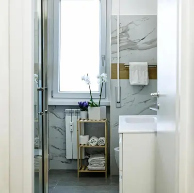a bathroom with a sink and a shower at 3 Passi Da Metro Marconi- 8 min Colosseo in Rome