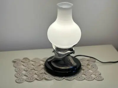 a black and white vase sitting on a table at Sophia Luxury Home confortevole e in ottima posizione in Rome