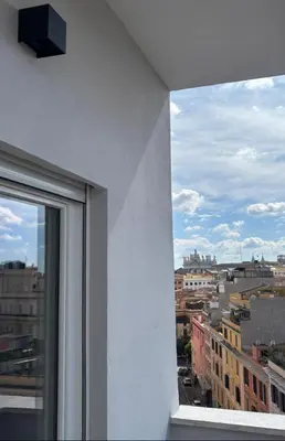 a view of a city from a window of a building at URBAN CONCEPT Santa Croce in Gerusalemme - Entire apartment in Rome