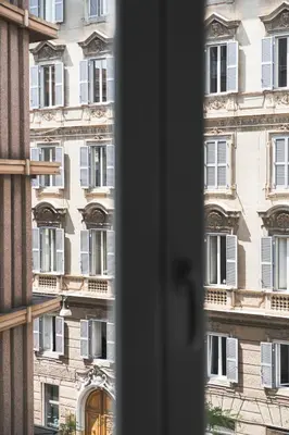 a view of a building from a window at Stylish 1BR, 2BATH Apartment Castel Sant'Angelo 6A in Rome
