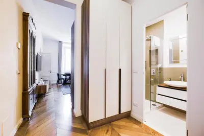 a bathroom with a sink and a mirror at Stylish 1BR, 2BATH Apartment Castel Sant'Angelo 6A in Rome