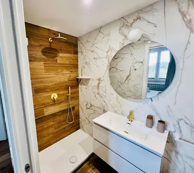 a bathroom with a sink and a mirror at LP San Giovanni Apartment in Rome
