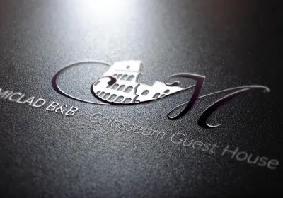 a logo for a custom guest house with a heart at MICLAD Colosseum Guest House in Rome