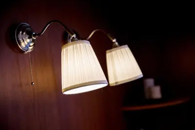 two lights hanging on a wall in a room at MICLAD Colosseum Guest House in Rome