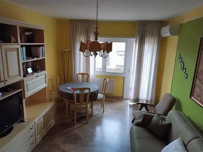 a living room with a couch and a table at Casa Caselli in Rome