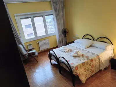 a bedroom with a bed and a window at Casa Caselli in Rome