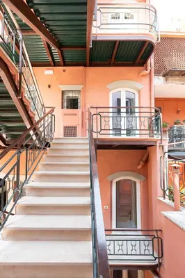 a set of stairs in an apartment building at Residenza Foraggi 83 in Rome