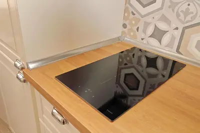a tablet is in the drawer of a cabinet at Cozy new flat near the Station! in Rome
