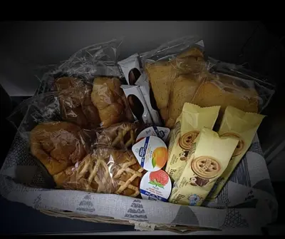 a basket filled with different types of bread at Casa Nostra a Centocelle in Rome