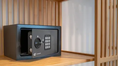 a small tv sitting on a wooden shelf at Domus Pietra nel cuore di Roma in Rome
