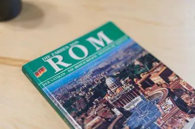 a magazine with the word roma on the cover at Gold Spanish's Steps in Rome