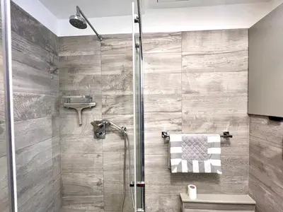 a bathroom with a shower and a sink at My Roman Home - Prati Vaticano in Rome