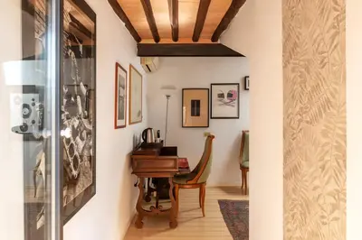 a home office with a desk and a chair at White Room with bathroom and Shared Terrace in Rome