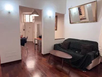 a living room with a couch and a table at Sanniti House in Rome
