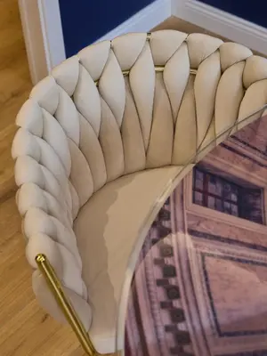a chair with a pencil sitting on top of it at Merulanasuite Saint John in Rome