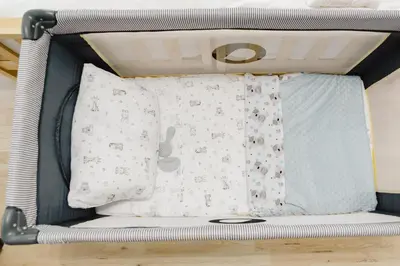 a bunk bed with two pillows and a blanket at Gioele's Apartment in Rome
