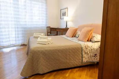 a white bathroom with a sink and a toilet at Sempione-Metro B, Vintage Apartment, AC, WiFi in Rome