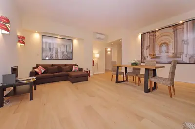 a living room with a couch and a table at Gioia's Home in Rome