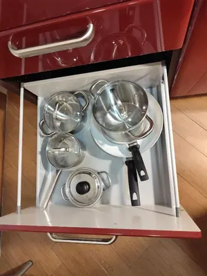 a set of straining utensils in a drawer at Next Stop St Peter - Apartment in Rome