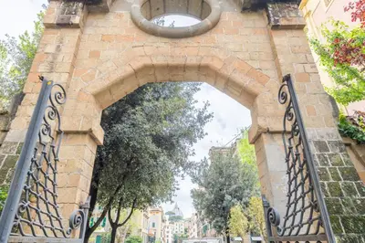 an entrance to an archway in a building at San Pietro View Boutique Rooms in Rome