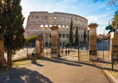 a large building with a gate in front of it at Residenza a Monti in Rome