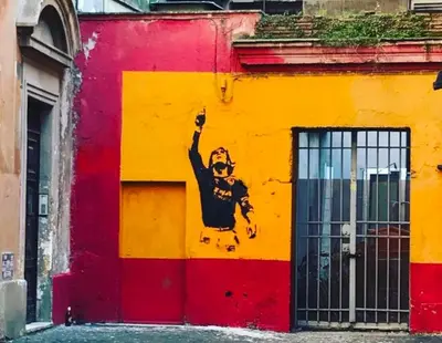 a wall with a painting of a man on it at Residenza a Monti in Rome