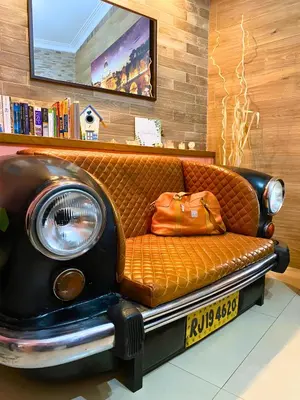 an old car with a purse sitting on top of it at The Best Nest in Rome