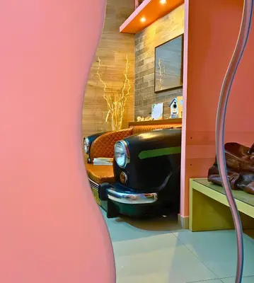 a room with an old car in a bedroom at The Best Nest in Rome