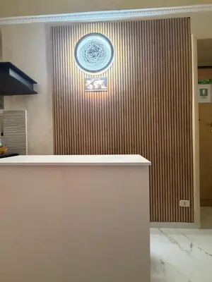 a room with a white table and chairs on a tile floor at BeLLa Vista in Rome