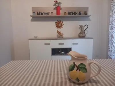 a vase sitting on top of a table at A Casa di Mario al Pigneto in Rome