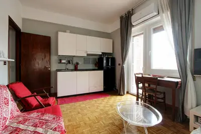a living room with a couch and a table at Le Note Di Angela in Rome